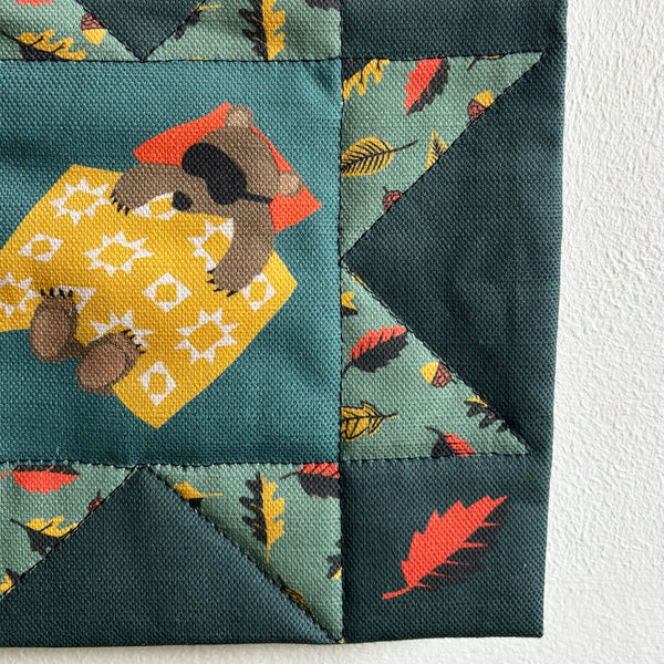 Mini quilt wall hanging | Sleepy hibernating bear
